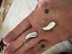 pair of lumity 90R hearing aids in palm of hand