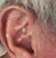 Genesis AI tucking away neatly behind the wearers ear