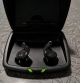 Pair of Genesis custom hearing aids in the charger