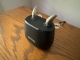 pair of oticon intent 1 with earmolds in charger