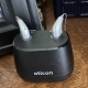 Two Oticon Intent devices in the charger