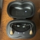 pair of genesis ai mric 20 hearing aids in charger, color beige