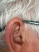 side profile shot of resound nexia 9 on ear