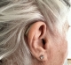 single right audeo sphere 90 hearing aid in sand beige on the ear