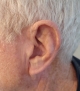 Phonak Audeo Sphere 90 in sand beige seen on the left ear side profile