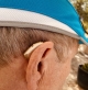 Phonak Sphere Infinio 90 on the right ear in sand beige