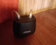 Pair of Oticon Intent 1 in chroma beige in the standard charger