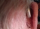 Single right oticon intent 1 in chroma beige behind the ear
