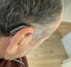 Phonak Audeo Infinio Sphere 90 in graphite grey on right ear back profile