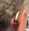 Phonak Sphere 90 in champagne on right ear