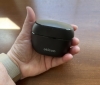 Oticon smart charger in hand
