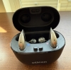 2 oticon intent 1 hearing aids in the smart charger