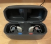 pair of vivia 9 hearing aids in the charger
