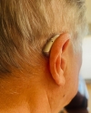 right Phonak audeo sphere infinio 90 in champagne on right ear