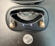 Pair of Starkey Edge AI 24 mRIC 24 hearing aids in charger