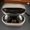 Pair of Phonak Audeo Sphere Infinio 90 in silver gray in charger
