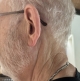Oticon Intent 1R chroma beige side profile view on ear