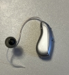phonak audeo sphere 90 in silver grey on counter