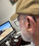 oticon intent minirite 1 R in black on left ear