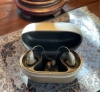 pair of phonak audeo infinio ultra sphere 90 in champagne in charger
