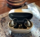 pair of phonak audeo infinio ultra sphere 90 in champagne in charger