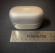 phonak audeo infinio ultra sphere charger next to ruler
