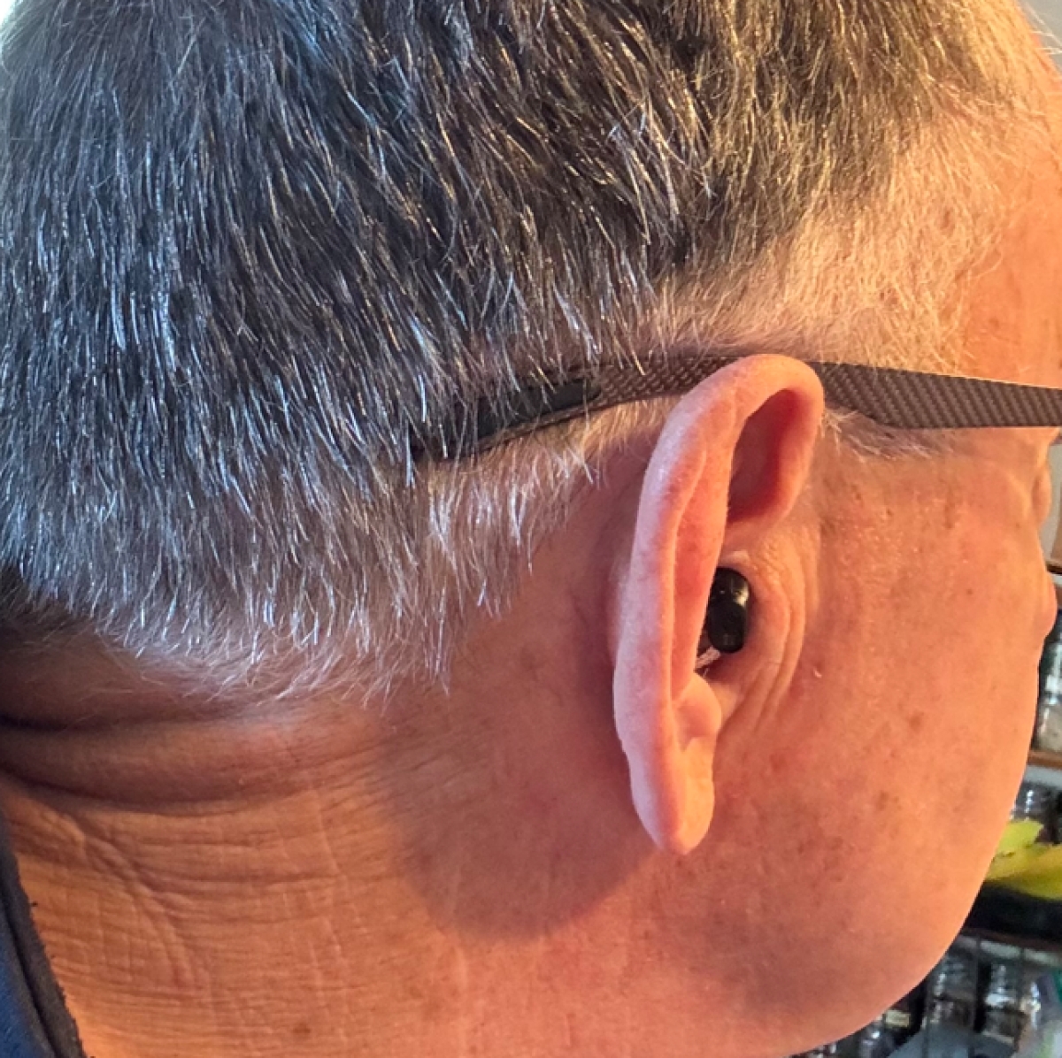 right oticon zeal in right ear close up shot from behind