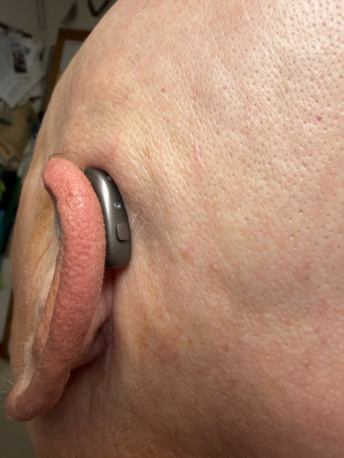 resound vivia 9 in warm grey in left ear behind the ear shot
