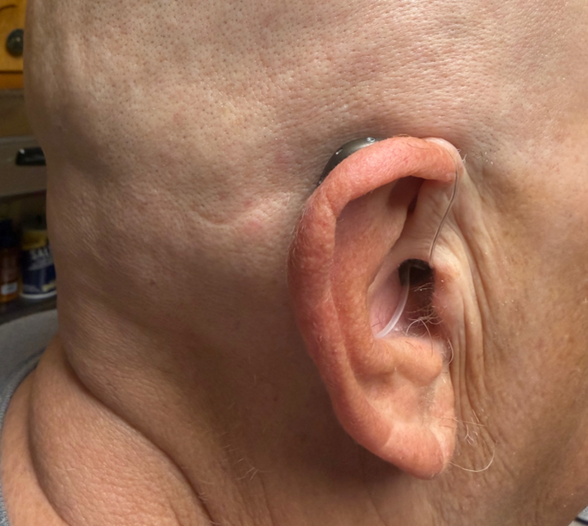 resound vivia 9 in warm grey in right ear side profile shot