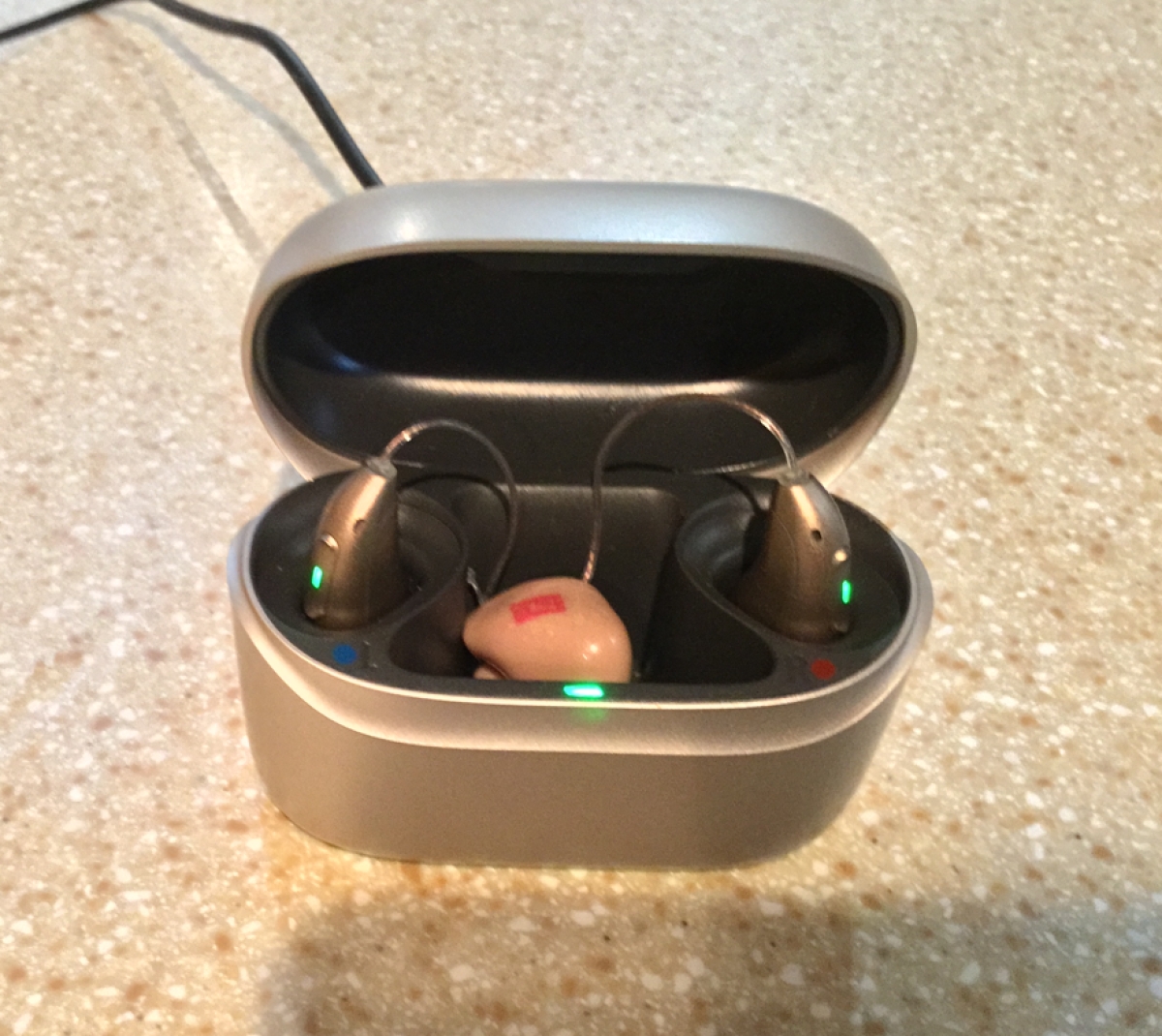 Pair of phonak sphere 70 with ear molds in charger