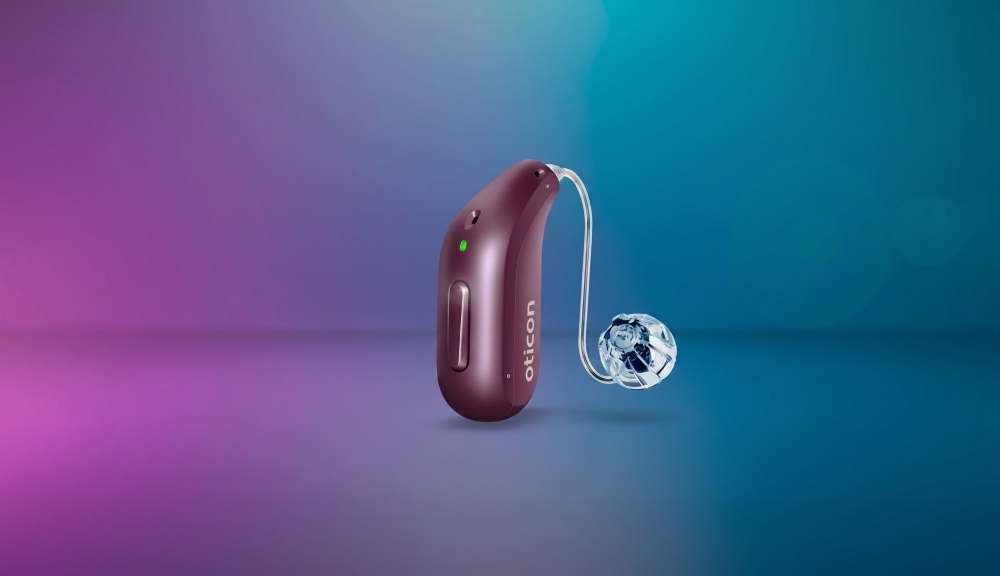 img of the new oticon reveal in color ddeep plum